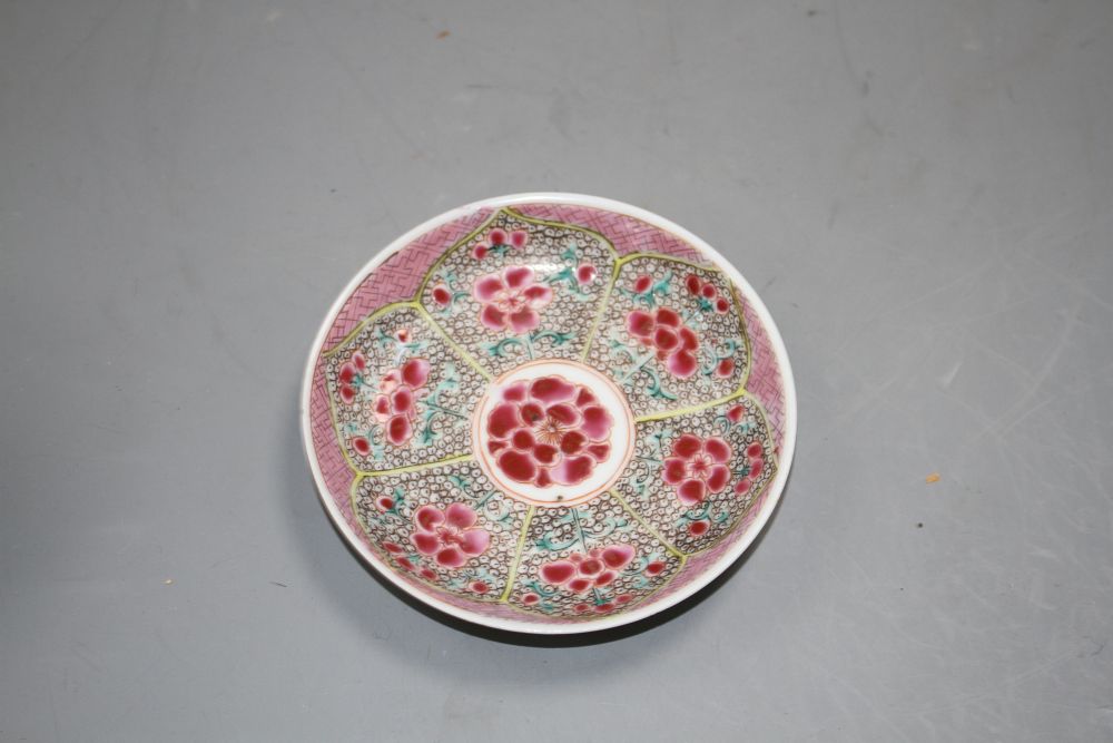 A Chinese famille rose tea bowl and associated saucer, Yongzheng period, saucer 10.2cm